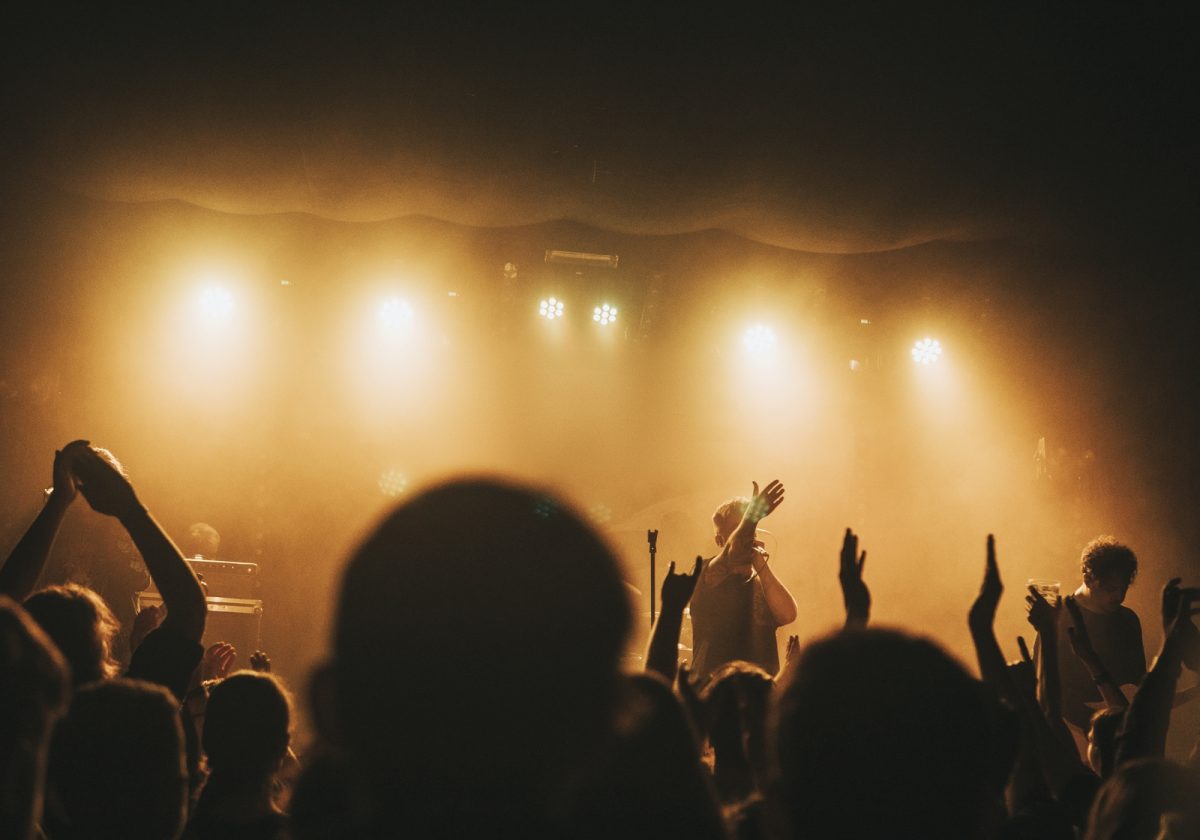Rock band playing a concert at a live house in Europe