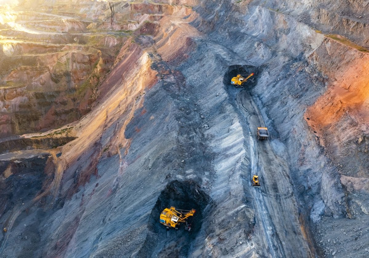 Aerial view of an open pit of iron ore. Resource mining