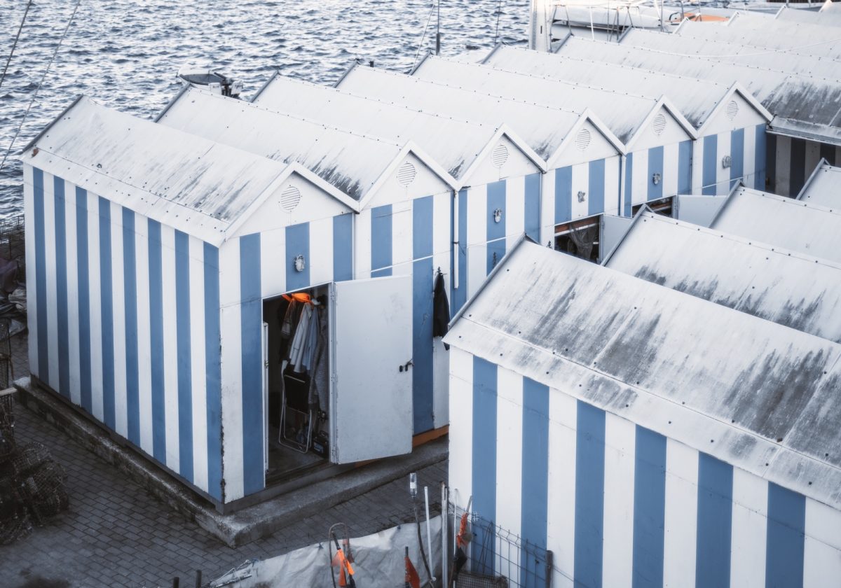 narrow-fishermen-cabins-near-a-river-2024-10-20-16-02-31-utc